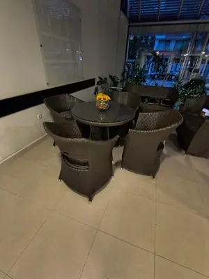 a dining room with a table and chairs at Slavi studios Aparthotel Exselsior, Sunny beach in Sunny Beach