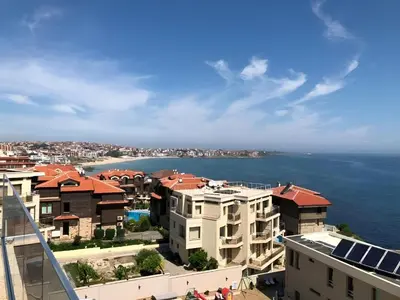 a view of the ocean from a building at APOLONIS hotel in Sozopol