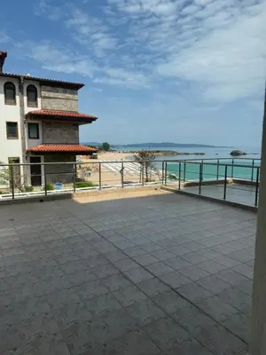 a view of the beach from the balcony of a building at Lozenetz Beach Apartments in Lozenets