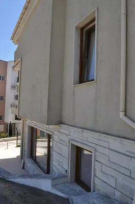 a building with windows on the side of it at Villa Sun Village Byala in Byala