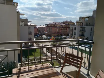a balcony with a bench and a view of a city at Sorrento Sole Mare Studio A Bastet BS in Sveti Vlas