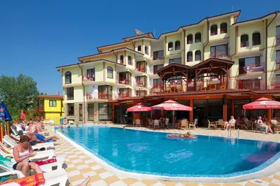 a swimming pool in front of a hotel at Hotel Smolyan in Sunny Beach