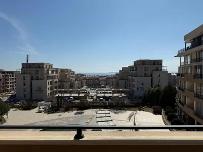 a view from a balcony of a city with buildings at Luxor Zaks Apartments in Sveti Vlas