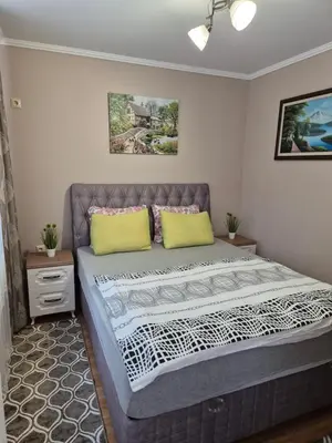 a bedroom with a bed in a room at Apartment Rosa Marina in Nesebar