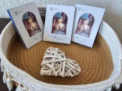 a basket with three books and a straw hat at KaliAnny in Santa Marina escape from daily routine in Sozopol