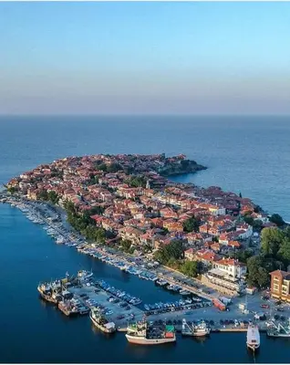 an aerial view of a harbor with boats in the water at Sozopol Sunrise in Sozopol