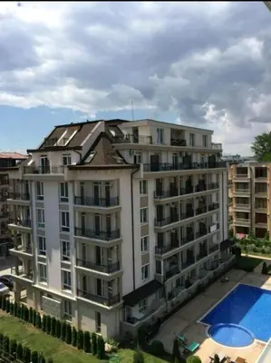 a large apartment building with a pool in front of it at Persani 3 Sanny Beach in Sunny Beach