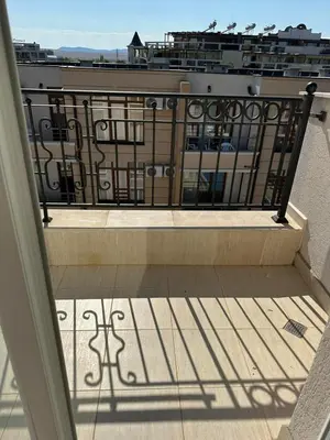 a balcony with a view of a building at Persani 3 Sanny Beach in Sunny Beach