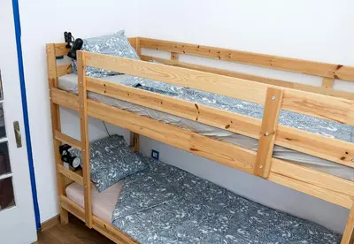 a couple of bunk beds in a room at Verano Azul - Adorable Flat in Unbeatable Location by Flat Mаnager in Varna City