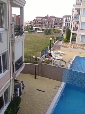 a view of a swimming pool from a building at Родина- Rey&Mar Apartment in Sveti Vlas