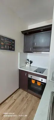 a small kitchen with a stove and a sink at Apartment Anna-Kalina in Obzor