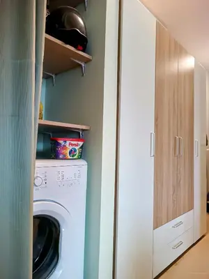 a laundry room with a washer and dryer at Hills view apartment in Sunny Beach