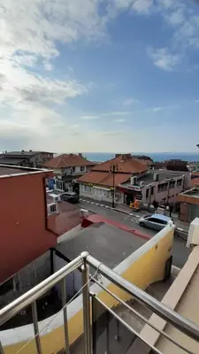 a view of a city from a balcony at Guest House Sveti Vlas in Sveti Vlas