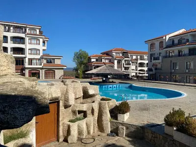 a swimming pool in the middle of a building at The Vineyard Spa&Resort Apartment with private garden near Aheloy in Kableshkovo
