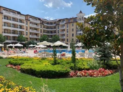 a large building with a pool and a resort at Apartment at Royal Sun, Sunny Beach in Sunny Beach