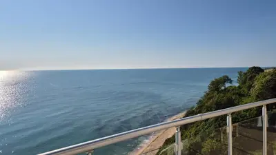 a view of the ocean from a balcony at Amazing panorama sea view apartment in Byala