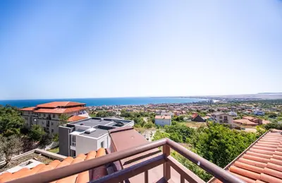 a view from the balcony of a house at Villa Belissima in Sveti Vlas