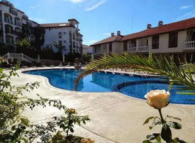 a swimming pool in the middle of a building at Sea Side Apartment with Balcony in Sveti Vlas