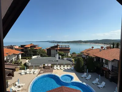 a view of a resort with a swimming pool at Cosy Seaview apartment Budjaka in Sozopol