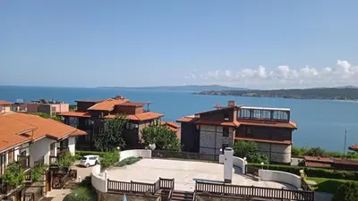 a group of houses with a view of the water at Cosy Seaview apartment Budjaka in Sozopol