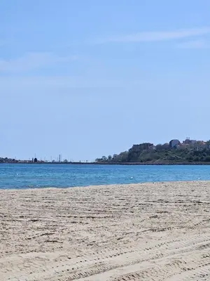 a sandy beach with water in the background at Elite 4 in Sunny Beach
