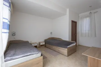 a bedroom with two beds in a room at Sea Garden Marina 1 Apartment Varna in Varna City