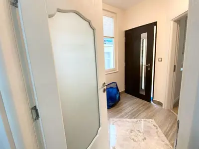 a door with a mirror in a room at New Yorker 2 bedroom apartment in Varna City