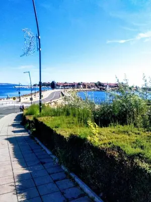 a street light on the side of a road at Vigo apartment in Nesebar