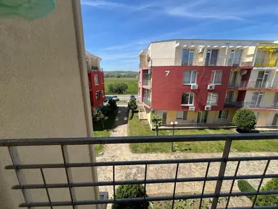 a view from a balcony of two buildings at Sunny day 5 in Tŭnkovo