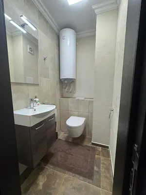 a bathroom with a toilet and a sink at Meerblick , Etera 4 in Sunny Beach
