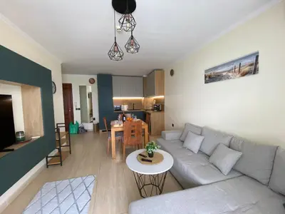 a living room with a couch and a table at ETARA - 1 Rey&Mar Saint Vlas in Sveti Vlas