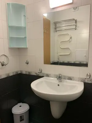 a bathroom with a sink and a mirror and a toilet at Garden of Eden- Apartments Sweet Dreams Rey&Mar Saint Vlas in Sveti Vlas