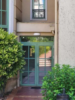 a door to a building with a sign on it at Solea Studio in Chernomorets