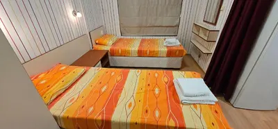 a room with two beds in a room at Rainbow 2 studio 40 in Sunny Beach