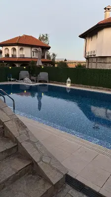 a large swimming pool in front of a house at Exklusive Villa am Sonnenstrand Bulgarien am Schwarzen Meer aheloy Cabernet 1 in Kableshkovo