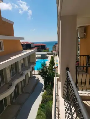 a view from the balcony of a building at Grand Villa Perle in Sveti Vlas