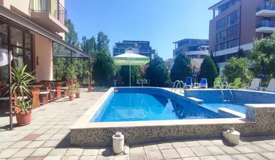 a swimming pool in the middle of a building at Hotel 415 in Sunny Beach