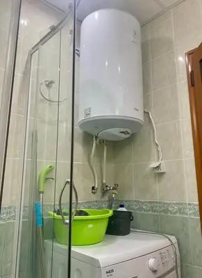 a kitchen with a sink and a shower at Studio Blue Triumph in Sveti Vlas