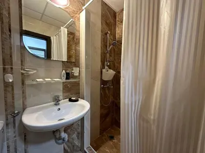 a bathroom with a sink and a shower at Apartment in Sveti Vlas in Sveti Vlas