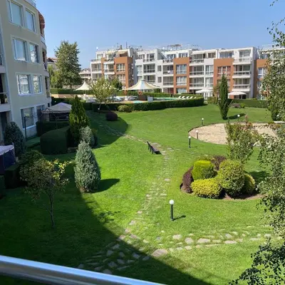 a view of a park in a city with buildings at Тристаен апартамент в затворен комплекс in Chernomorets