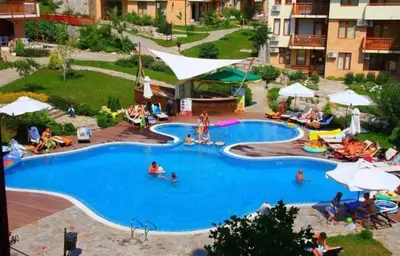a group of people in a swimming pool at Garden of Eden in Sveti Vlas