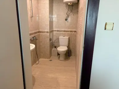 a bathroom with a toilet and a sink at Miramar palace 615S in Sunny Beach
