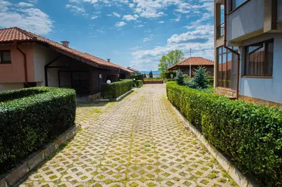 a cobblestone street in front of a building at 