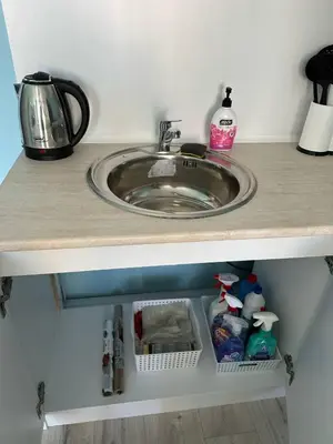 a bathroom vanity with a sink and a counter top at Дрийм 2 Мечта 2 in Sunny Beach