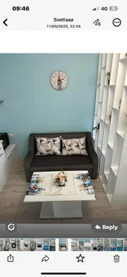 a living room with a couch and a table at Дрийм 2 Мечта 2 in Sunny Beach
