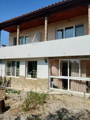 a house with a broken window at Kasndra in Byala