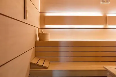 a set of stairs with a potted plant on them at Sea View Apartments Residence Лазурен бряг in Burgas City