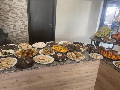 a buffet of different types of food on a table at Sunny Residence complex in Sunny Beach