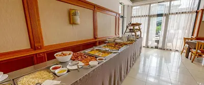 a buffet line with many different types of food at Sunny Residence complex in Sunny Beach