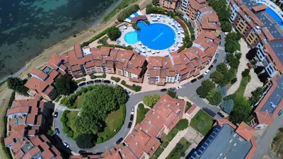 an overhead view of a house with a pool in a yard at Ваканционен Апартамент in Aheloy